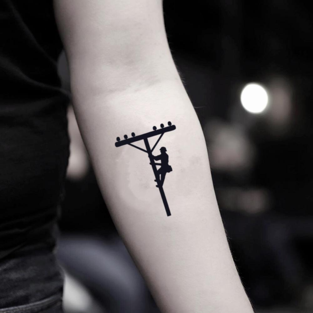 fake small lineman illustrative temporary tattoo sticker design idea on inner arm