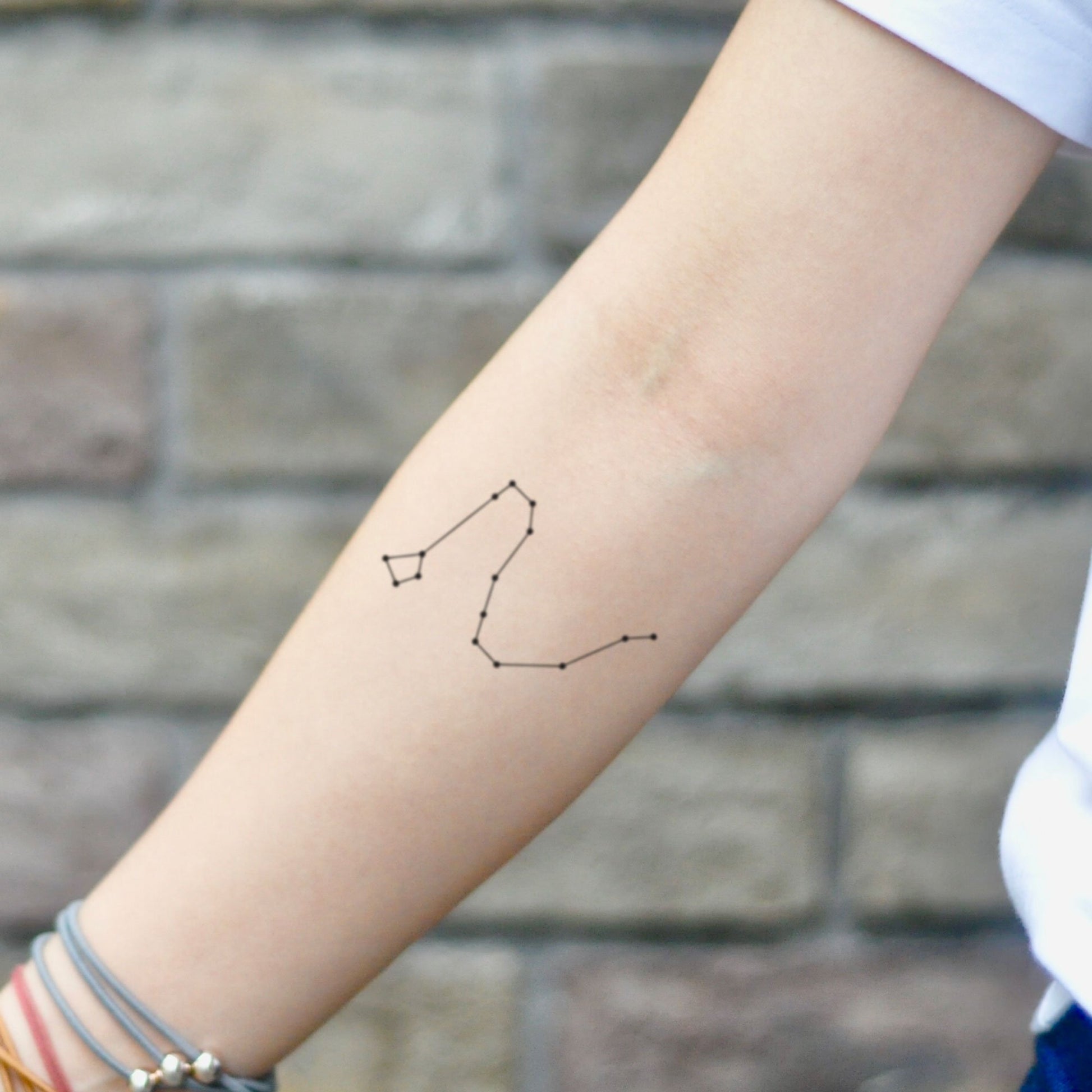 fake small draco constellation Minimalist temporary tattoo sticker design idea on inner arm